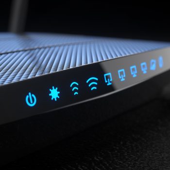 Wi-Fi wireless internet router on dark background 3d